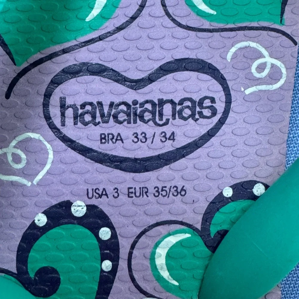 NEW UNWORN HAVAIANAS IN DARLING PURPLE/GREEN PRINT-3/4 YR